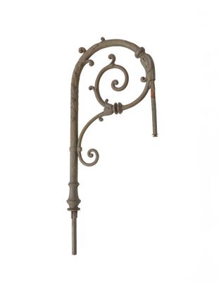 a close up of a metal pole with a decorative design on it