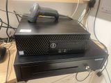 two computers on top of each other on a desk