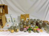 many jars and jars of food on a table