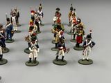 a lot of toy soldiers that are standing in a line