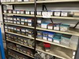 many shelves with many different types of boxes on them