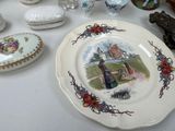 a plate with a picture of a woman on it on a table
