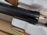 a black and silver microphone sitting in a box