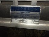 a close up of a sign on the grill of a car