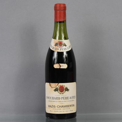a bottle of wine that is sitting on a table