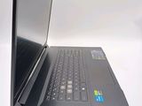 a laptop that is sitting on a white table