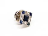 an image of a diamond and sapphire ring on a white background