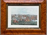 three framed pictures of horses racing on a track in a wood frame