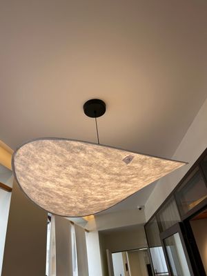 a light that is hanging from the ceiling in a room