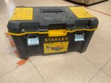 a black and yellow tool box sitting on the floor