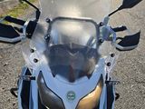 a motorcycle that is parked on the side of the road