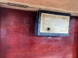 a box that has a label on it on the wall