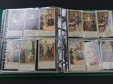 a green binder with a bunch of cards on it