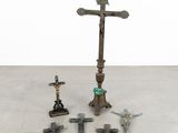 a lot of crosses on the floor next to each other