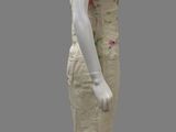 a mannequin wearing a dress with flowers on it