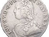 a close up of a coin on a white background