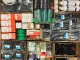 a box of assorted items sitting on the floor