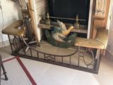 a fireplace with a fish on it in a living room