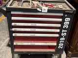 a lot of tools on a cart in the store