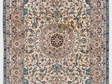tapis persan ancien à motif floral sur fond beige
