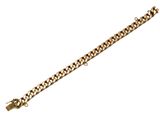 gros plan d'un bracelet en chaîne en or sur fond blanc