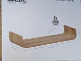 a box with a picture of a wooden shelf on it