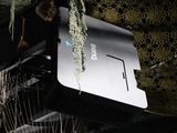 a laptop that is hanging from the ceiling of a building