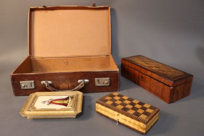 three pieces of luggage sitting next to each other on a table