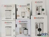 several boxes of appliances are stacked on top of each other
