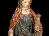 an image of a statue of a woman holding a book