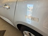 a close up of a car door with a sticker on it