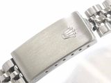 an image of a close up of a wrist with a watch on it