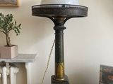 a lamp that is sitting on top of a table