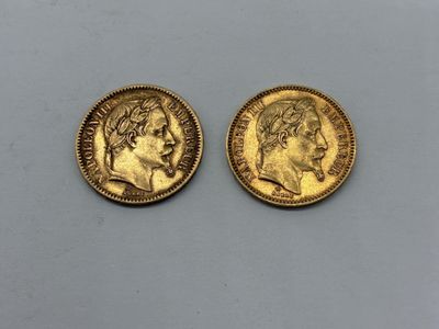 two gold sovereigns, one of which has a head of a man and the other of a woman