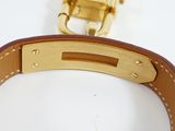 an image of a close up of a watch on a white surface