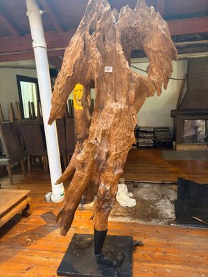 a large piece of wood sitting on top of a wooden floor