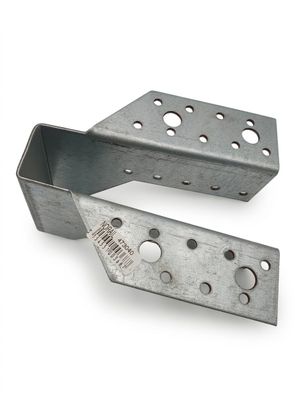 two pieces of metal are shown on a white surface