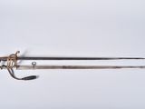 an old sword with a wooden handle on a white background