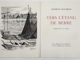 a book with a picture of a boat in the water
