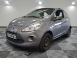 a picture of a small car parked in a garage