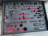 a tool box with a variety of tools inside of it