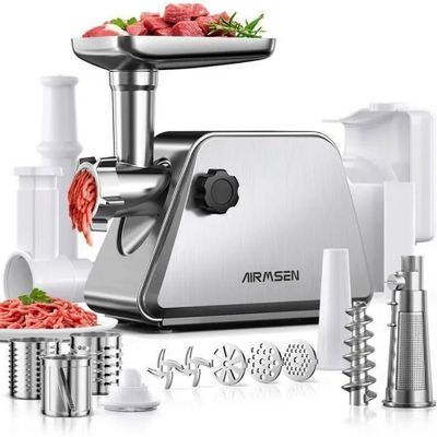 an image of a meat grinder with meat and vegetables on it