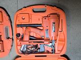 an orange tool case with tools in it on the floor