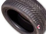 a close up of a tire on a white background