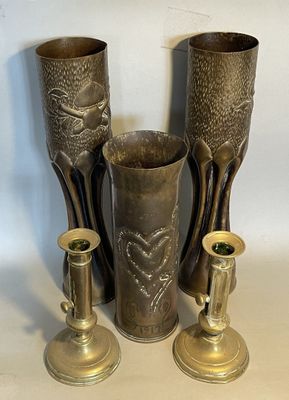 three vases sitting next to each other on a table