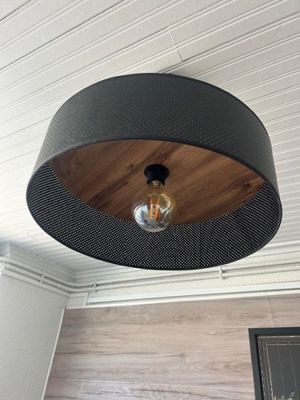 an image of a light fixture hanging from the ceiling
