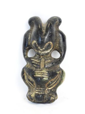 an image of a figurine of a man holding a baby