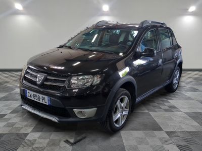 a picture of a black dacia parked on a checkered floor