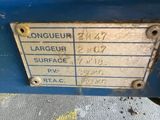a close up of a sign on the side of a machine