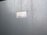 a close up of a metal box with a sign on it